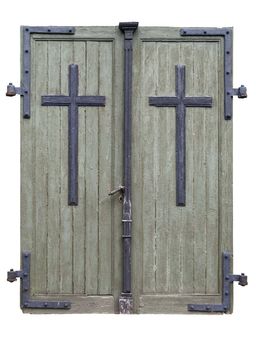 Wooden doors to an old catholic church built in 18th century. Isolated. Clipping path.