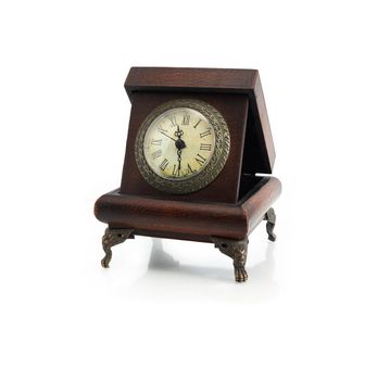 Vintage wooden desk clock on white background. Clipping path is included
