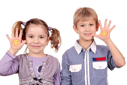 happy little girl and boy with smiley on hand