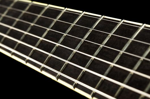electric guitar fretboard, isolated on black background
