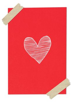 Handwriting heart shape on red paper with tape