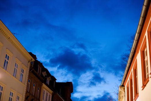 Beautiful buildings in the city centre of Heidelberg, Germany with a great evening sky