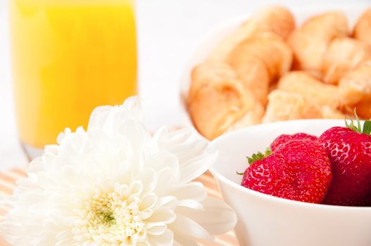 Breakfast with berries,orange juice and croissant, early breakfast