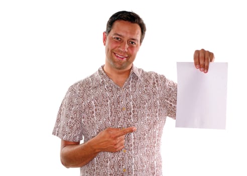 Young man pointing to portrait style blank piece of paper for advertisement