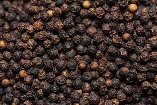 A back ground of black pepper corns