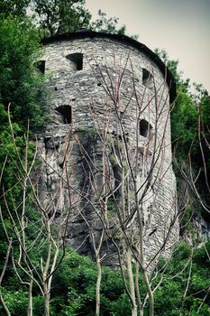 abandoned medieval castle at stormy summer day