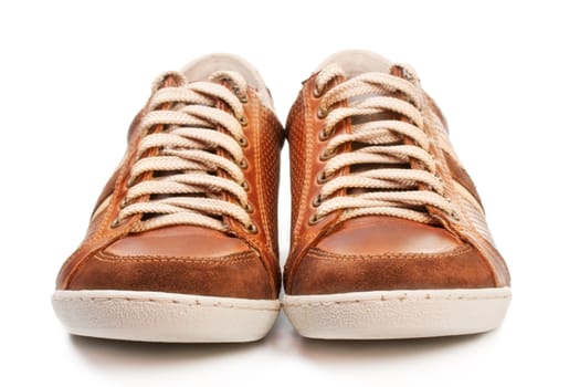 brown leather trainer shoe isolated on white