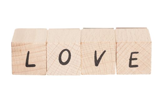 The word love constructed out ouf wooden blocks.