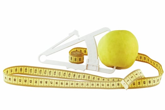 apple, meter and caliper on a white background (isolated object)