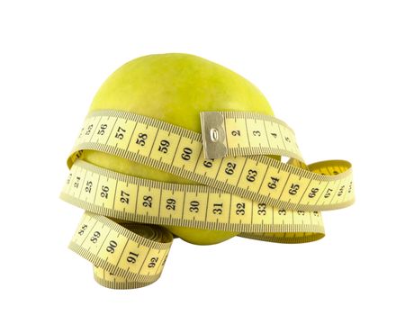 green apple and measuring tape on a white background