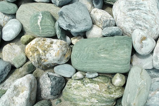 Sea stones and pebbles closeup as background