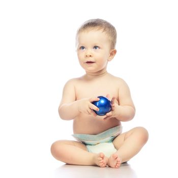 baby playing with christmas ball, isolated on white