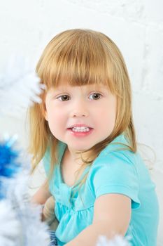 beautiful little girl in blue shirt, portrait