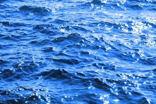 Atlantic ocean waves sparkling in the gentle soft waves