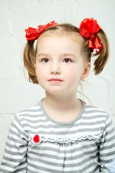 beautiful little girl with red bow-knot, portrait