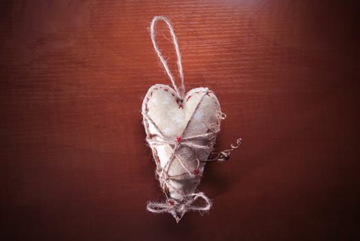 Rope heart on the wood backgroumd. Love background