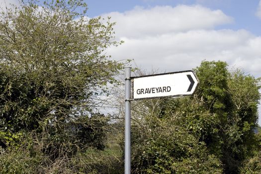 direction sign for a graveyard in the Irish countryside