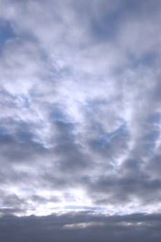 white fluffy clouds on a bright blue day