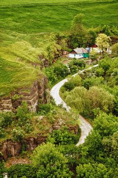 summer landscape with houses and road, high angle view