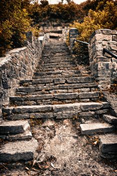 old ruined stone stairway on a hill