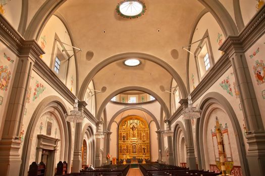 Mission Basilica San Juan Capistrano Church California Inside with Altar.  This is the successor church to the Mission founded by Father Junipero Serra in 1775.