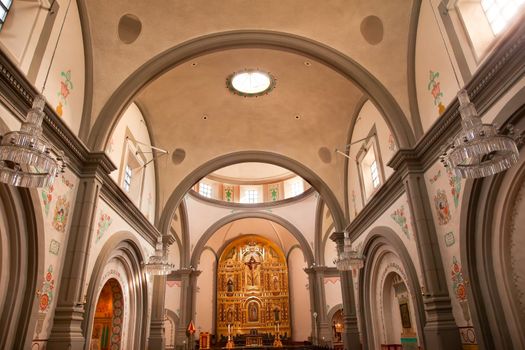 Mission Basilica San Juan Capistrano Church California Inside with Altar.  This is the successor church to the Mission founded by Father Junipero Serra in 1775.