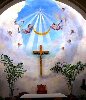 Altar Angels Cross Crucifix Old Immaculate Conception Church Old San Diego California  Historic Adobe Church built originally in 1851.  The Old Adobe Church was restored and reopened in 1917.