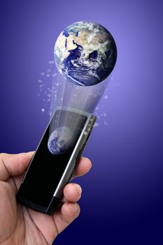 Hand holding mobile phone with earth globe
