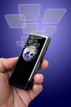 Hand holding mobile phone with earth globe