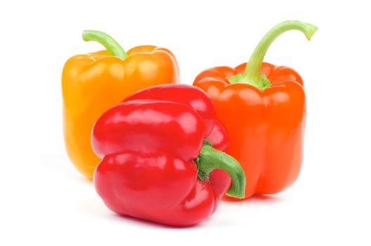 Red, Orange and Yellow Bell Peppers isolated on white background