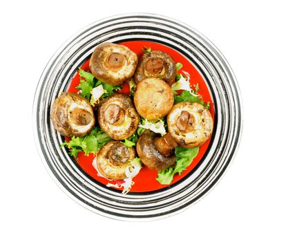 Grilled Mushrooms with Greens on Red Plate. Top View