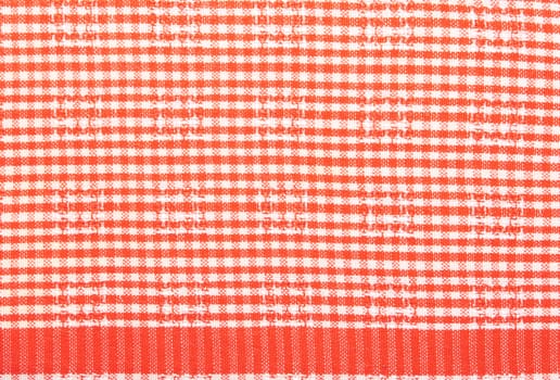 Textiles. Bright red plaid  fabric as natural background