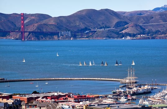 Fisherman's Wharf Golden Gate Bridge Sailboats from Coit Tower San Francisco California on Telegraph Hill.