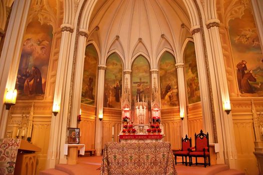 Altar and Basilica in National Shrine of Saint Francis of Assisi San Francisco California.  Church has relics of St Francis.  This church was founded in 1849 and rededicated in 1919 after church was destroyed in 1905 earthquake.