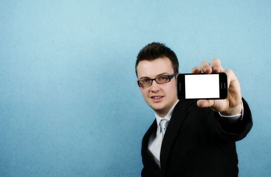 Man holding out a phone with a blank screen
