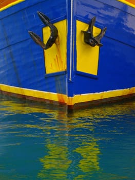 wooden ship bow with reflection