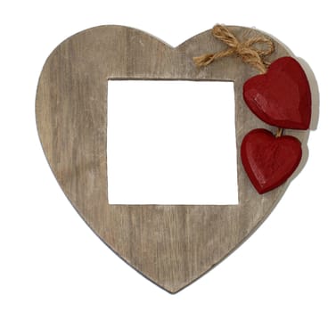 A heart shaped wooden board which has an editable white space