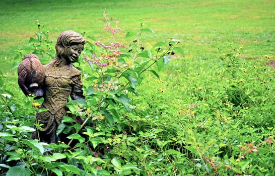 Girl statue in garden - background 2