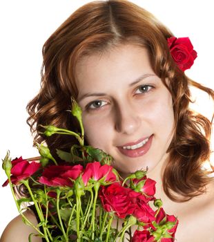 beautiful girl with red roses on a white background isolated
