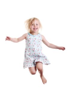 cute little girl jumping on white background