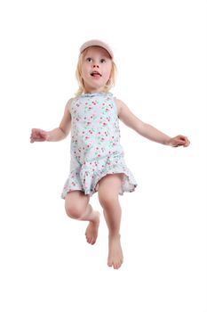 cute little girl jumping on white background