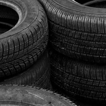 Pile of old rubber tires for background