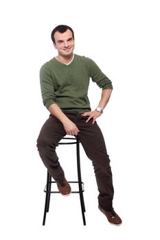 casual young adult on a chair, isolated on white