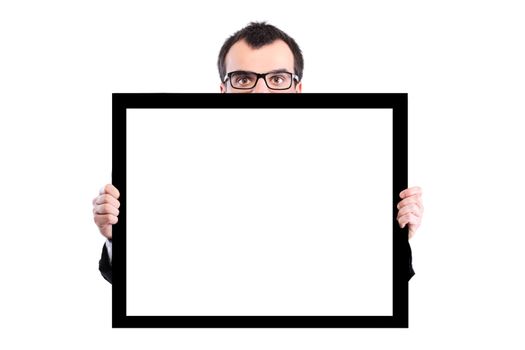 yound businessman with glasses holding white empty panel, isolated on white