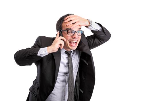 surprised businessman on the phone, isolated on white