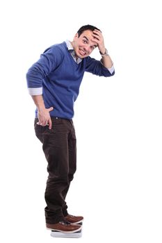 surprised man on a weight scale, isolated on white