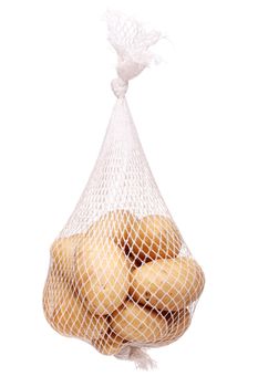 bunch fresh potatoes in a white mesh bag