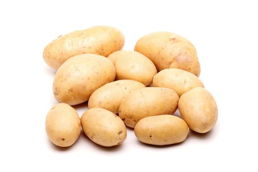 bunch of fresh potatoes against white