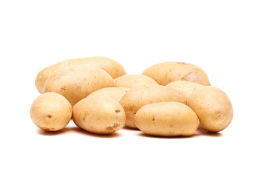 bunch of fresh potatoes against white