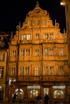 Heidelberg, Germany - February 2, 2013: Traditional Hotel Zum Ritter in Heidelberg, Germany in the evening of February 2, 2013. Heidelberg is a well-known tourist attraction due to its old history and beautiful location at the Neckar river.